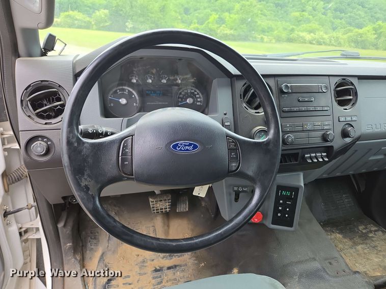 image for item DP6402 2011 Ford F750 Super Duty Ext. Cab dump flatbed truck