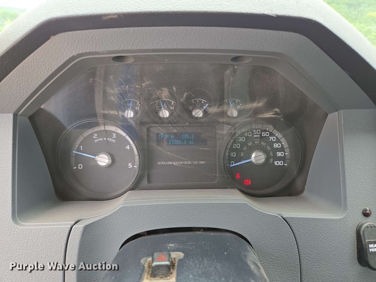 image for item DP6402 2011 Ford F750 Super Duty Ext. Cab dump flatbed truck