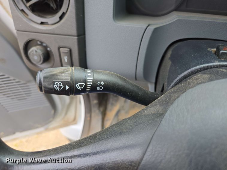 image for item DP6402 2011 Ford F750 Super Duty Ext. Cab dump flatbed truck