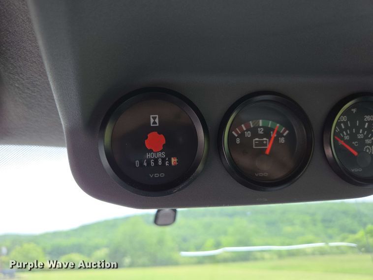 image for item DP6402 2011 Ford F750 Super Duty Ext. Cab dump flatbed truck