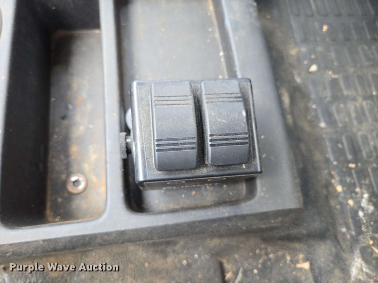 image for item DP6402 2011 Ford F750 Super Duty Ext. Cab dump flatbed truck