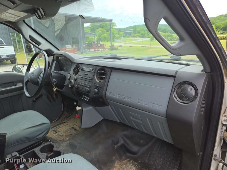 image for item DP6402 2011 Ford F750 Super Duty Ext. Cab dump flatbed truck