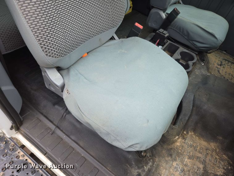 image for item DP6402 2011 Ford F750 Super Duty Ext. Cab dump flatbed truck