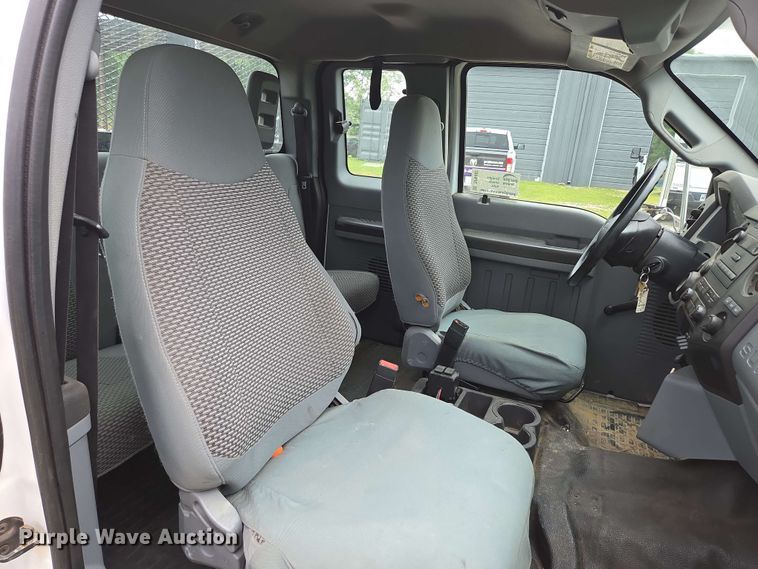 image for item DP6402 2011 Ford F750 Super Duty Ext. Cab dump flatbed truck