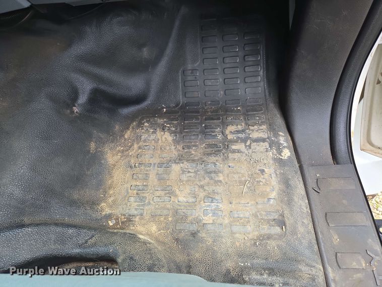 image for item DP6402 2011 Ford F750 Super Duty Ext. Cab dump flatbed truck