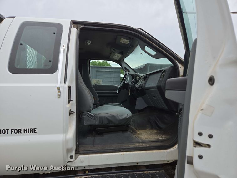 image for item DP6402 2011 Ford F750 Super Duty Ext. Cab dump flatbed truck