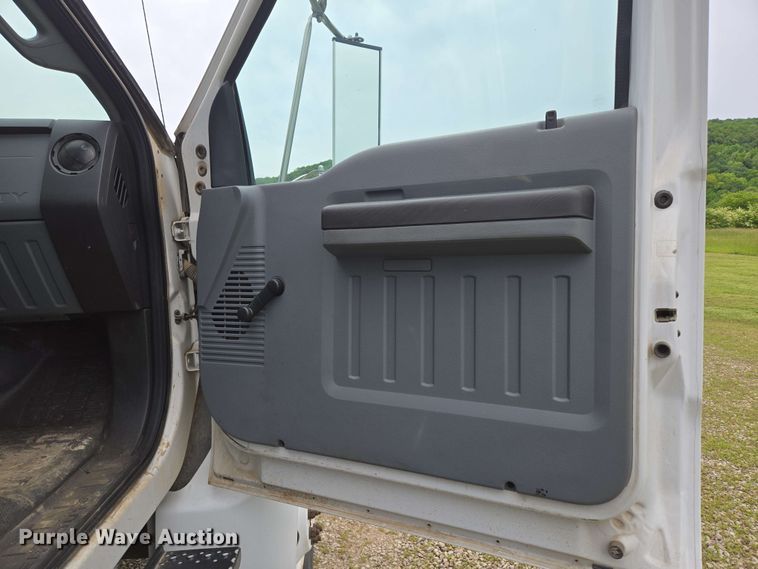 image for item DP6402 2011 Ford F750 Super Duty Ext. Cab dump flatbed truck