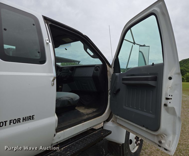 image for item DP6402 2011 Ford F750 Super Duty Ext. Cab dump flatbed truck