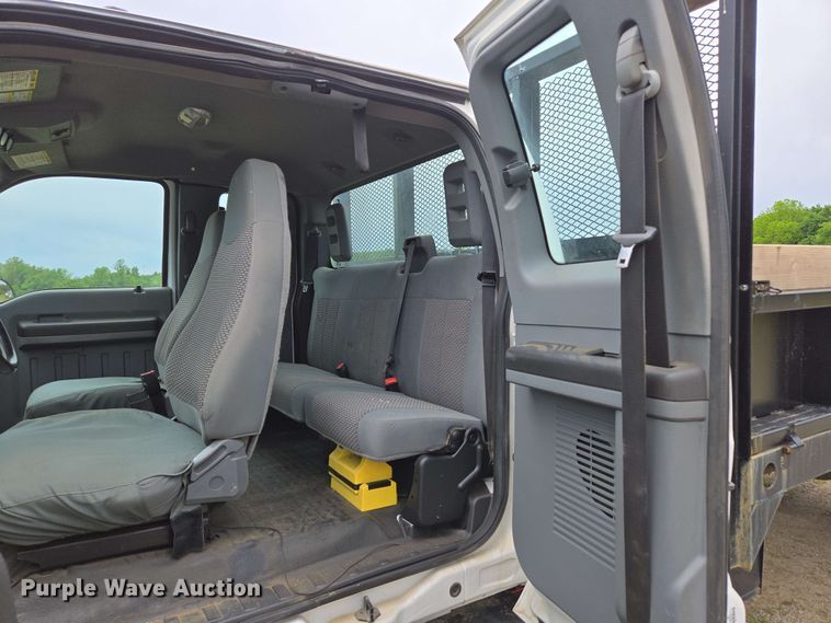 image for item DP6402 2011 Ford F750 Super Duty Ext. Cab dump flatbed truck