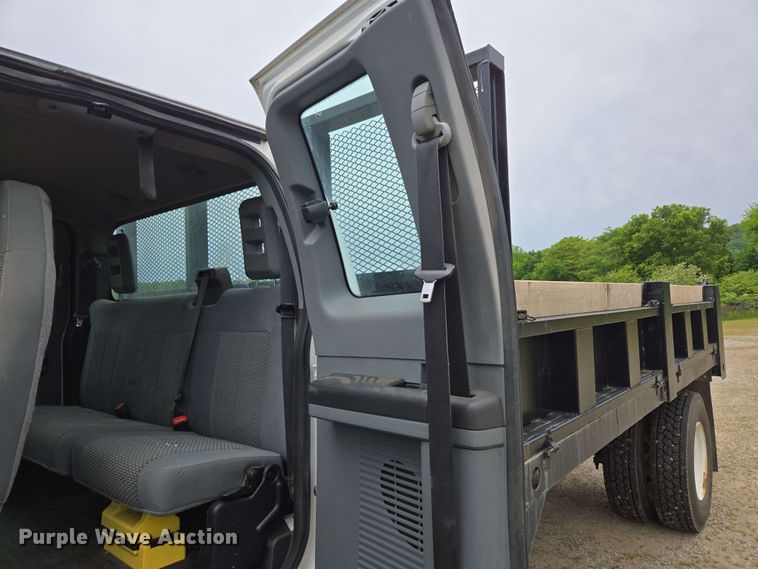 image for item DP6402 2011 Ford F750 Super Duty Ext. Cab dump flatbed truck