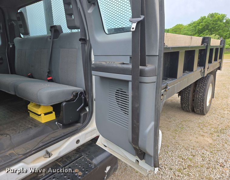 image for item DP6402 2011 Ford F750 Super Duty Ext. Cab dump flatbed truck