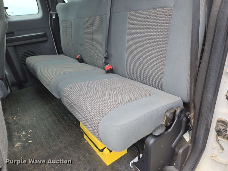 image for item DP6402 2011 Ford F750 Super Duty Ext. Cab dump flatbed truck