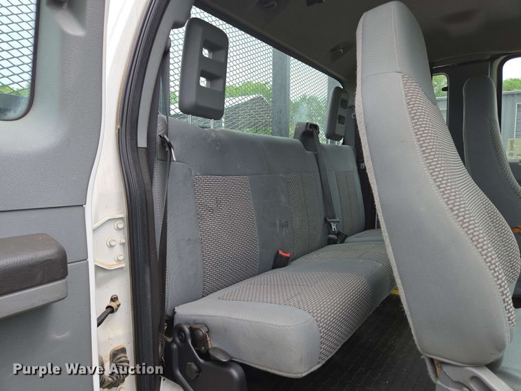 image for item DP6402 2011 Ford F750 Super Duty Ext. Cab dump flatbed truck