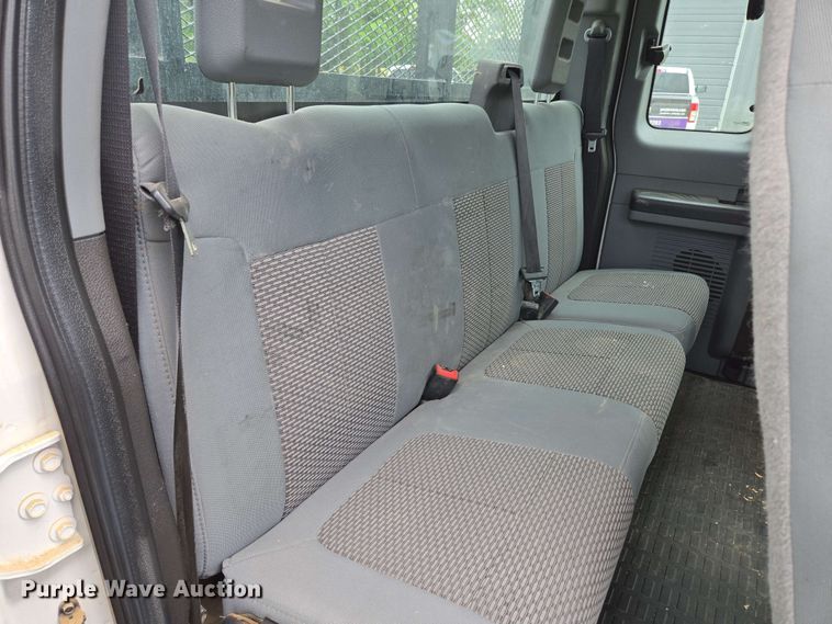 image for item DP6402 2011 Ford F750 Super Duty Ext. Cab dump flatbed truck