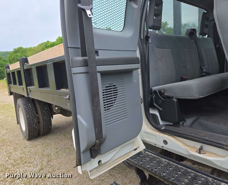 image for item DP6402 2011 Ford F750 Super Duty Ext. Cab dump flatbed truck