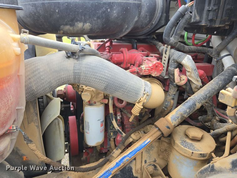 image for item DP6402 2011 Ford F750 Super Duty Ext. Cab dump flatbed truck