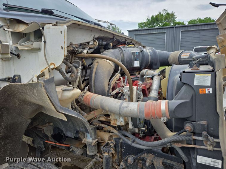 image for item DP6402 2011 Ford F750 Super Duty Ext. Cab dump flatbed truck