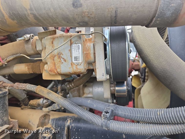 image for item DP6402 2011 Ford F750 Super Duty Ext. Cab dump flatbed truck