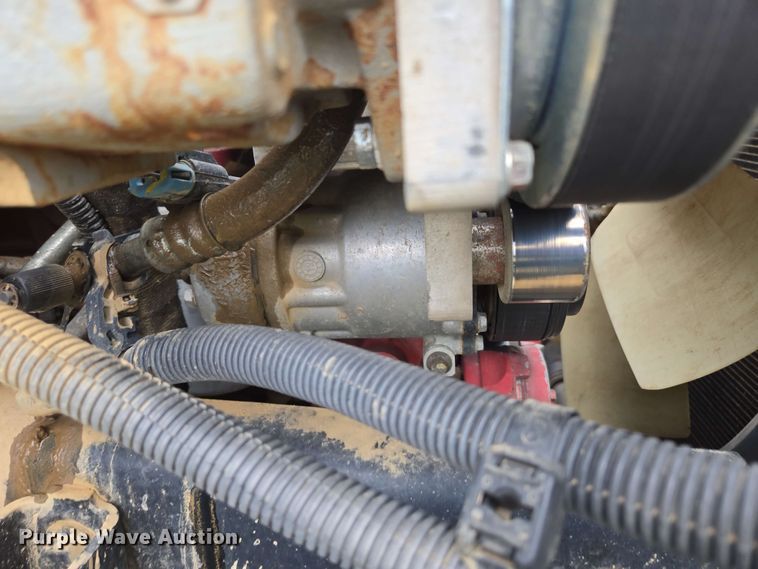 image for item DP6402 2011 Ford F750 Super Duty Ext. Cab dump flatbed truck