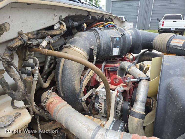 image for item DP6402 2011 Ford F750 Super Duty Ext. Cab dump flatbed truck