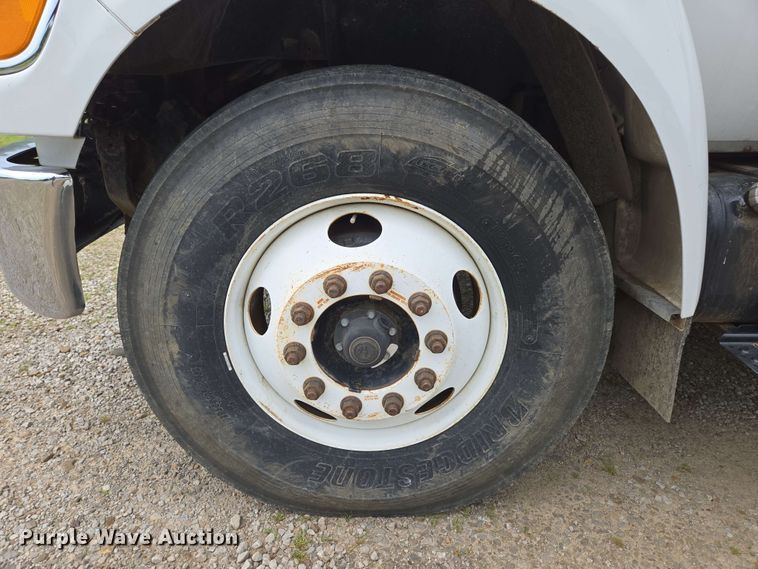 image for item DP6402 2011 Ford F750 Super Duty Ext. Cab dump flatbed truck