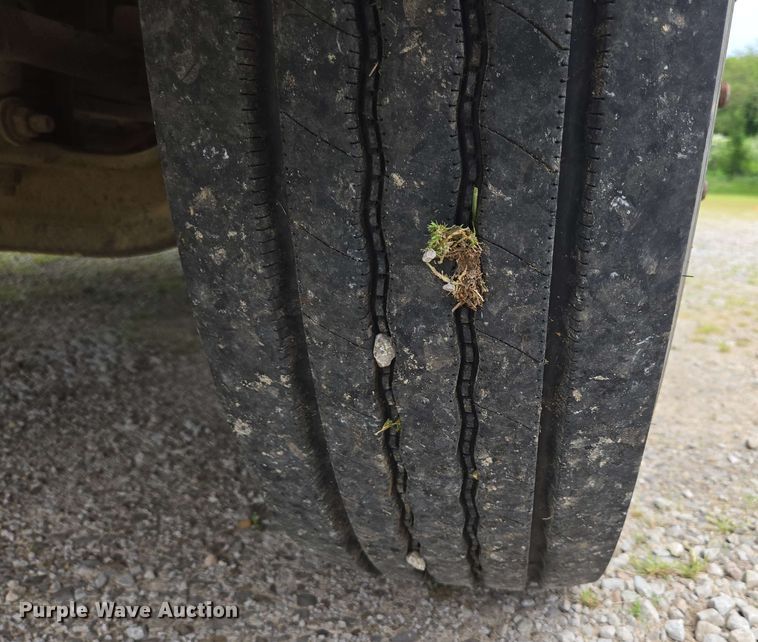 image for item DP6402 2011 Ford F750 Super Duty Ext. Cab dump flatbed truck