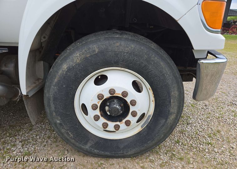 image for item DP6402 2011 Ford F750 Super Duty Ext. Cab dump flatbed truck