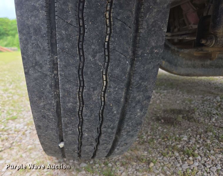 image for item DP6402 2011 Ford F750 Super Duty Ext. Cab dump flatbed truck