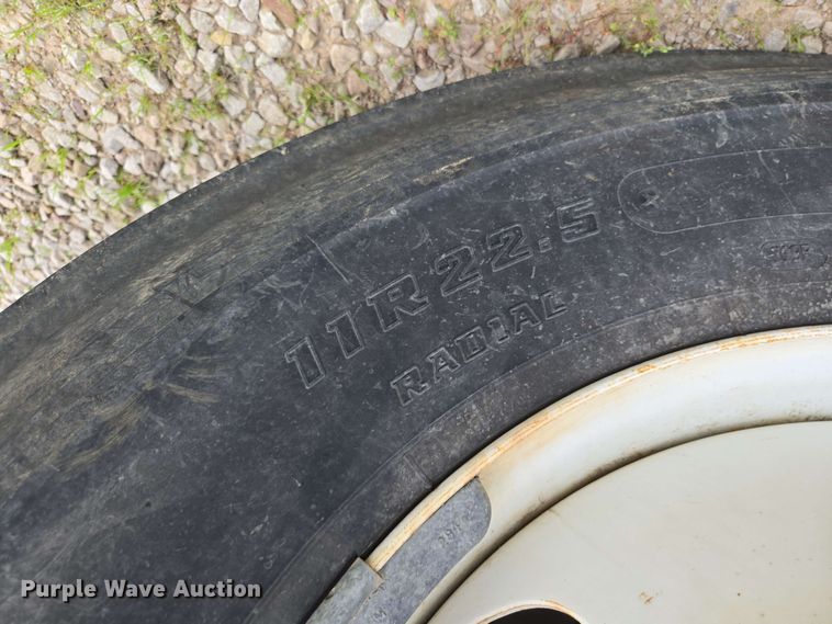 image for item DP6402 2011 Ford F750 Super Duty Ext. Cab dump flatbed truck