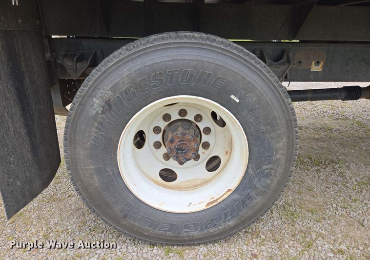 image for item DP6402 2011 Ford F750 Super Duty Ext. Cab dump flatbed truck