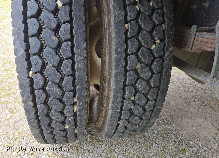 image for item DP6402 2011 Ford F750 Super Duty Ext. Cab dump flatbed truck