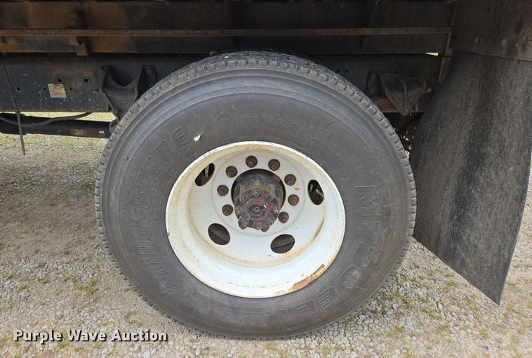 image for item DP6402 2011 Ford F750 Super Duty Ext. Cab dump flatbed truck