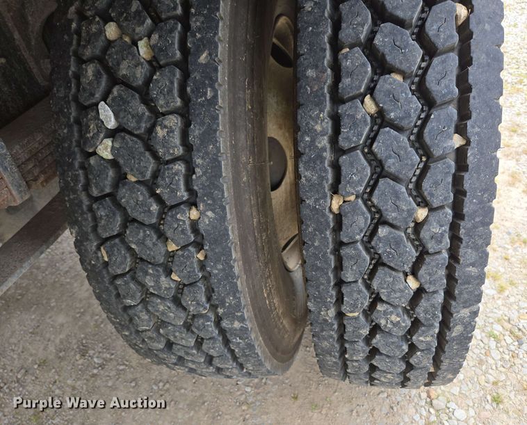 image for item DP6402 2011 Ford F750 Super Duty Ext. Cab dump flatbed truck