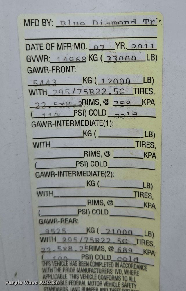 image for item DP6402 2011 Ford F750 Super Duty Ext. Cab dump flatbed truck