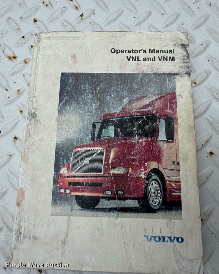 image for item DU9764 1999 Volvo VNL flatbed truck