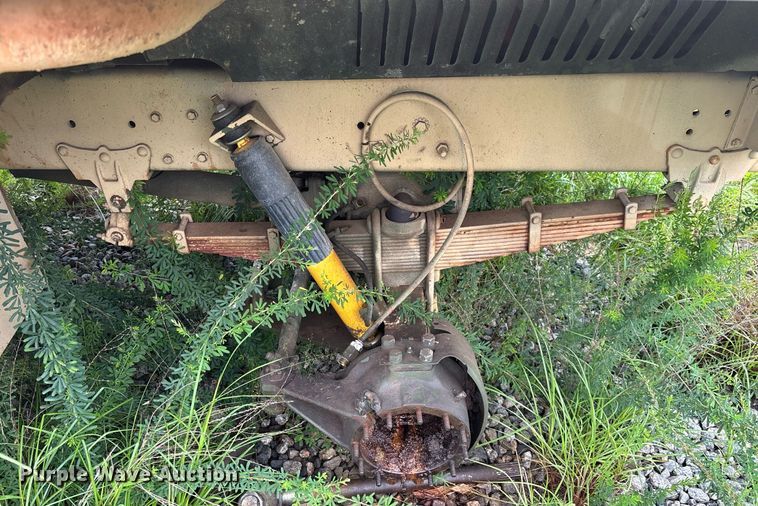 image for item EC3653 2001 AM General M35A3 flatbed truck