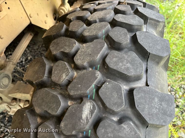 image for item EC3653 2001 AM General M35A3 flatbed truck