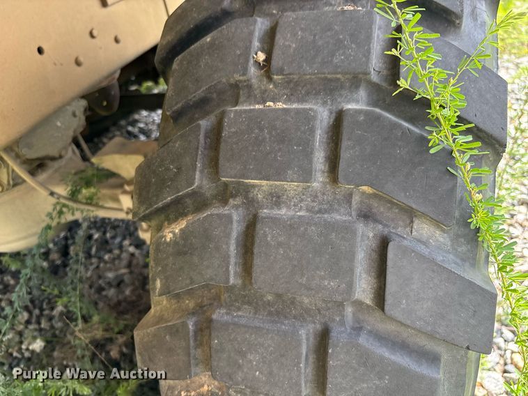 image for item EC3653 2001 AM General M35A3 flatbed truck