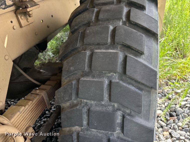 image for item EC3653 2001 AM General M35A3 flatbed truck