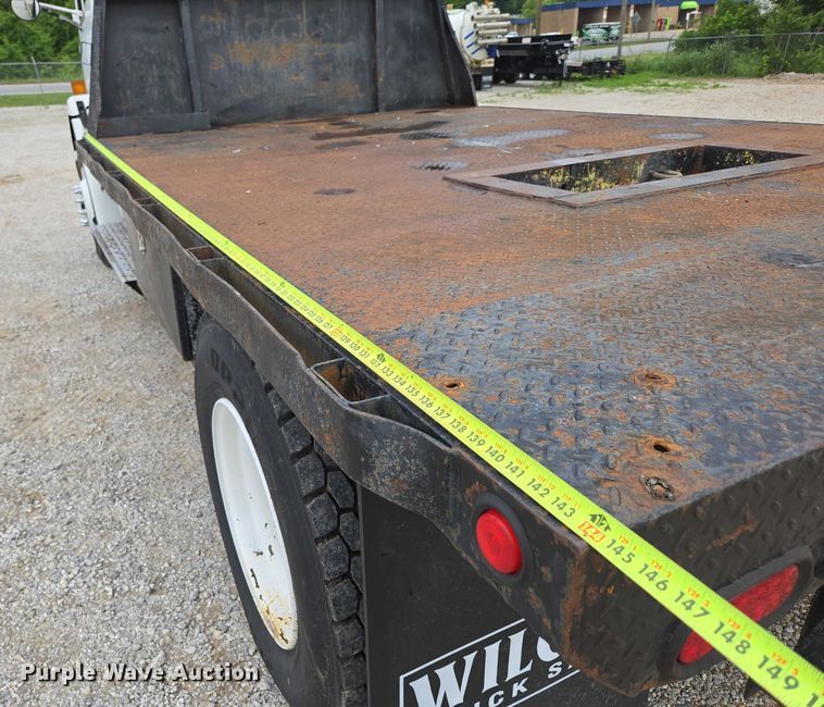 image for item ED2047 2000 Freightliner FL80 flatbed truck