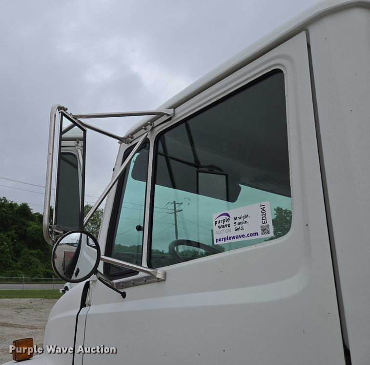 image for item ED2047 2000 Freightliner FL80 flatbed truck