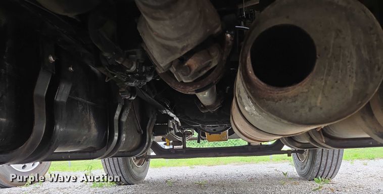 image for item ED2047 2000 Freightliner FL80 flatbed truck