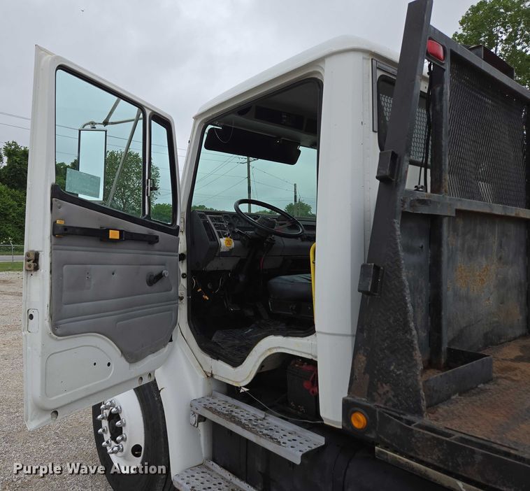 image for item ED2047 2000 Freightliner FL80 flatbed truck