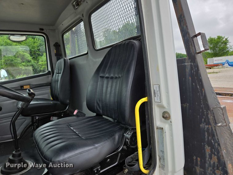 image for item ED2047 2000 Freightliner FL80 flatbed truck