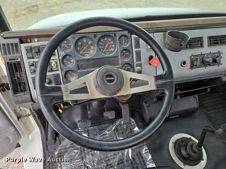 image for item ED2047 2000 Freightliner FL80 flatbed truck