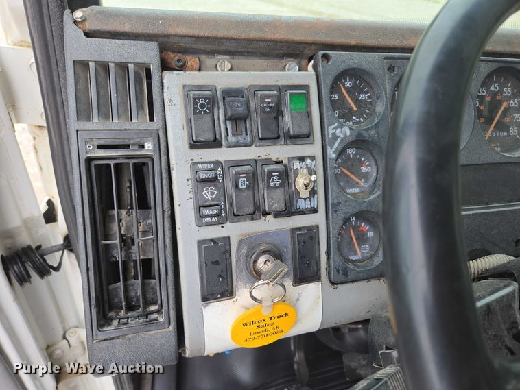 image for item ED2047 2000 Freightliner FL80 flatbed truck