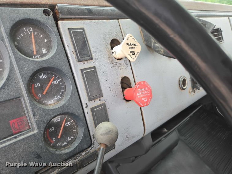 image for item ED2047 2000 Freightliner FL80 flatbed truck