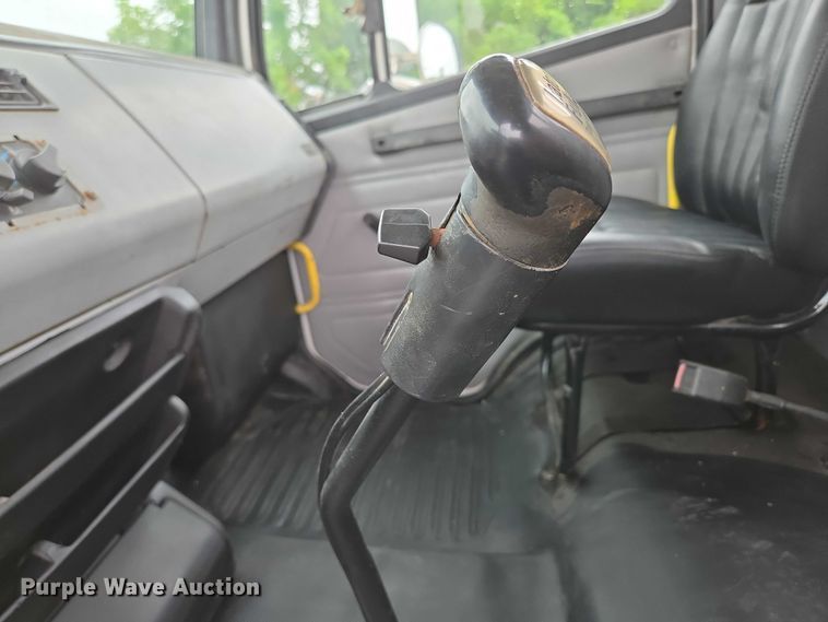 image for item ED2047 2000 Freightliner FL80 flatbed truck