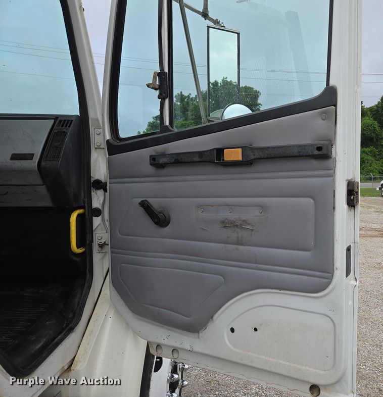 image for item ED2047 2000 Freightliner FL80 flatbed truck