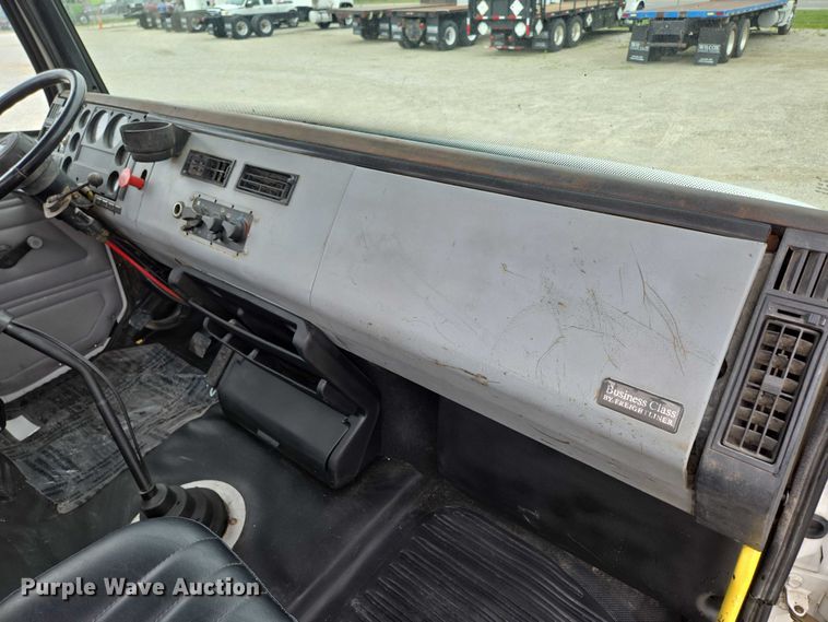 image for item ED2047 2000 Freightliner FL80 flatbed truck